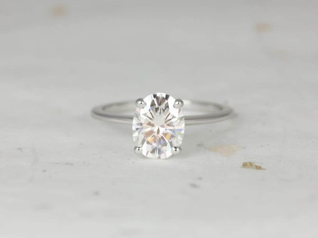 Oval solitaire engagement on sale ring thin band